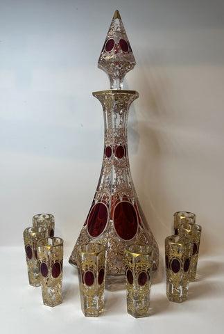 Bohemian Moser Enameled Glass Decanter and Eight Cordials. Clear, Red, Gold