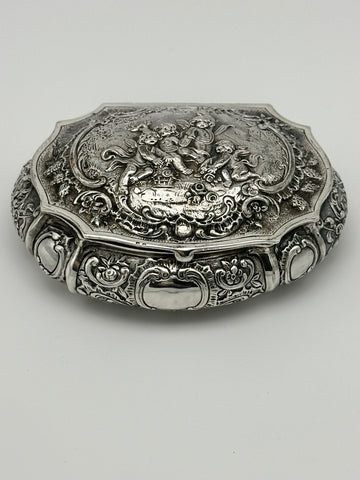 German 800 Silver Repousse Box. Cherubs and Flowers. Circa 1890. 4 3/4" x 4"