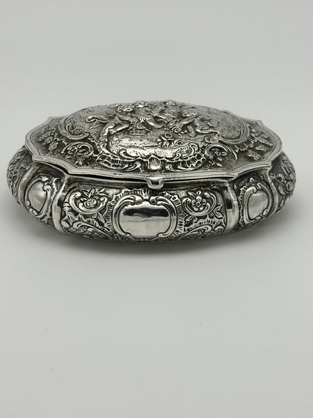 German 800 Silver Repousse Box. Cherubs and Flowers. Circa 1890. 4 3/4" x 4"