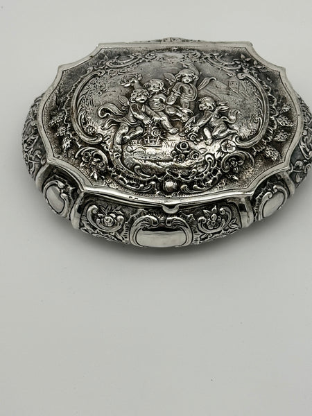 German 800 Silver Repousse Box. Cherubs and Flowers. Circa 1890. 4 3/4" x 4"