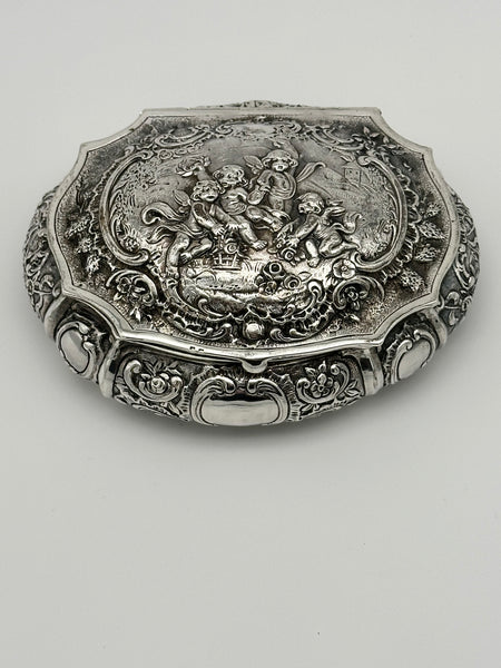 German 800 Silver Repousse Box. Cherubs and Flowers. Circa 1890. 4 3/4" x 4"