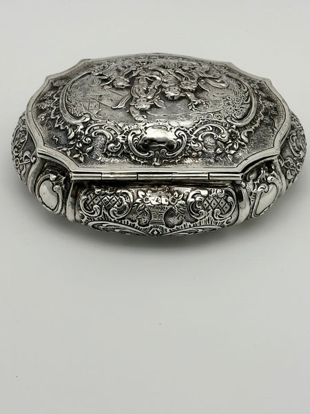 German 800 Silver Repousse Box. Cherubs and Flowers. Circa 1890. 4 3/4" x 4"