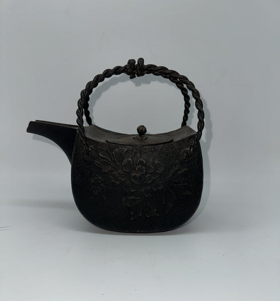 Japanese Iron Tetsubin Tea Pot. Twisted Handle. Cherry Blossom Motif.