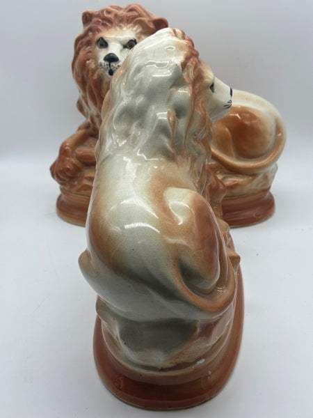 Pair of Staffordshire Pottery Lions. Late 19th century. 11" Length