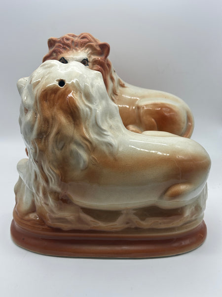 Pair of Staffordshire Pottery Lions. Late 19th century. 11" Length