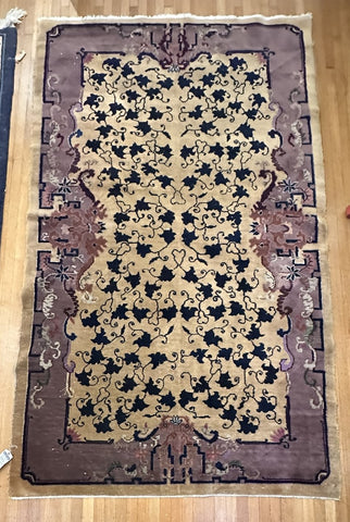 Chinese Area Rug. Beige Ground Purple Border. Circa 1920s. 7' 8" x 4' 5.5"