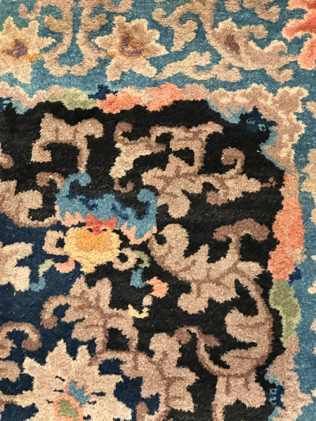 Chinese Area Rug. Dark Blue with Pink and Blue Border. Early 20th C. 6' x 8' 8"