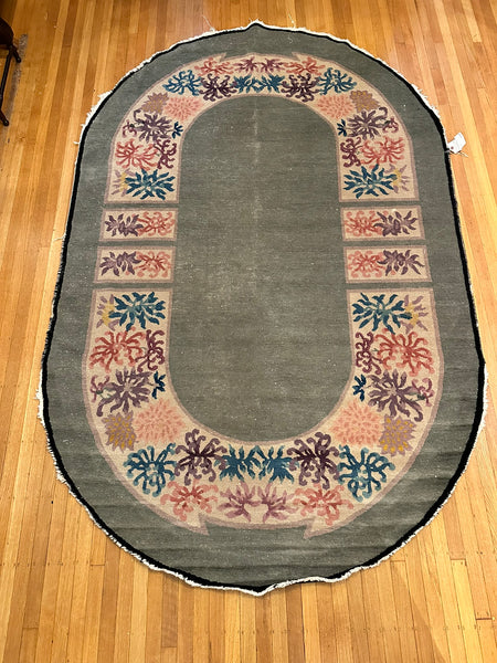 Chinese Rug. Celery Green with Floral Border. Early 20th Century. 7' 10" x 5'