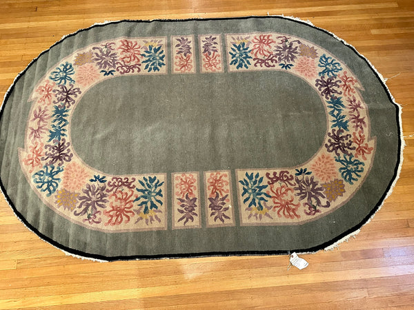 Chinese Rug. Celery Green with Floral Border. Early 20th Century. 7' 10" x 5'