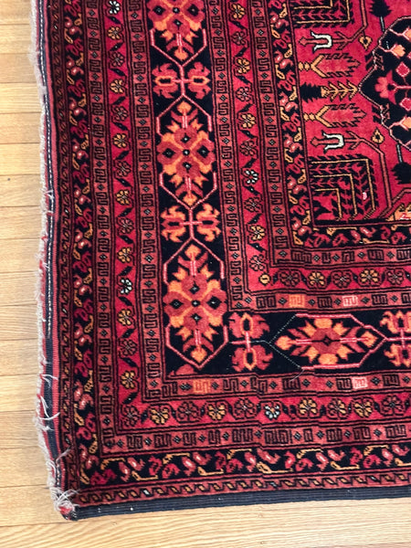 Caucasian Rug. Red with Black, Blue and Beige. Circa 1910. 6' 7" x 4' 11" (CABE)