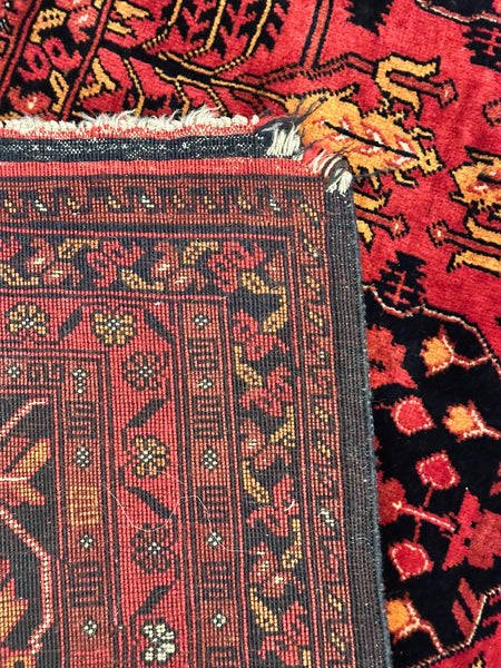 Caucasian Rug. Red with Black, Blue and Beige. Circa 1910. 6' 7" x 4' 11" (CABE)