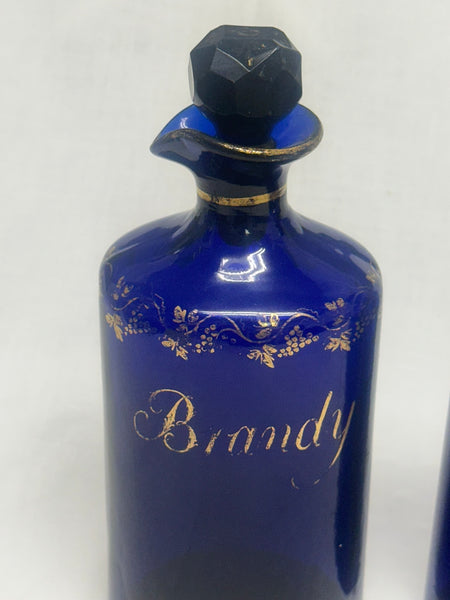 Three Liquor Decanters. Bristol Blue and Gold Glass. 18th Century