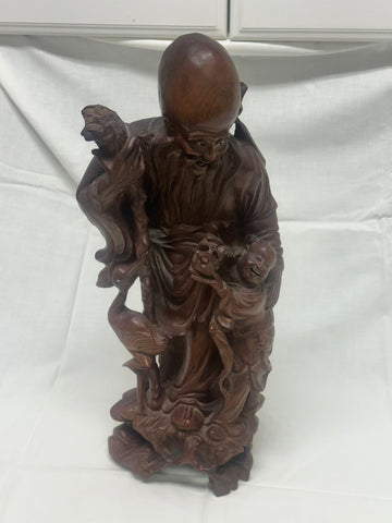 Chinese Carved Wood Immortal with Crane and Boy. Qing. 16 1/2" height