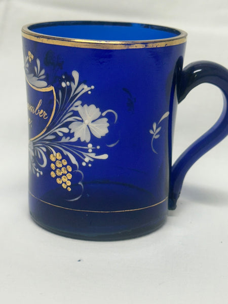 Remember Me Mug. Cobalt Blue Glass with Enamel Flowers and Leaves.