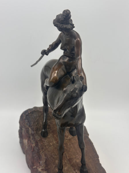 Bronze Figural of a Huntress on Horseback. Stone Base. Unsigned. 11" Height