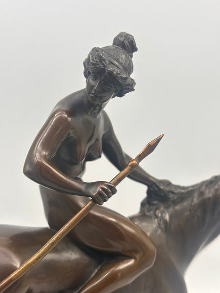Bronze Figural of a Huntress on Horseback. Stone Base. Unsigned. 11" Height