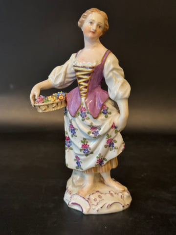 German Meissen Porcelain Figurine of Lady with Basket of Flowers. 5 1/4"